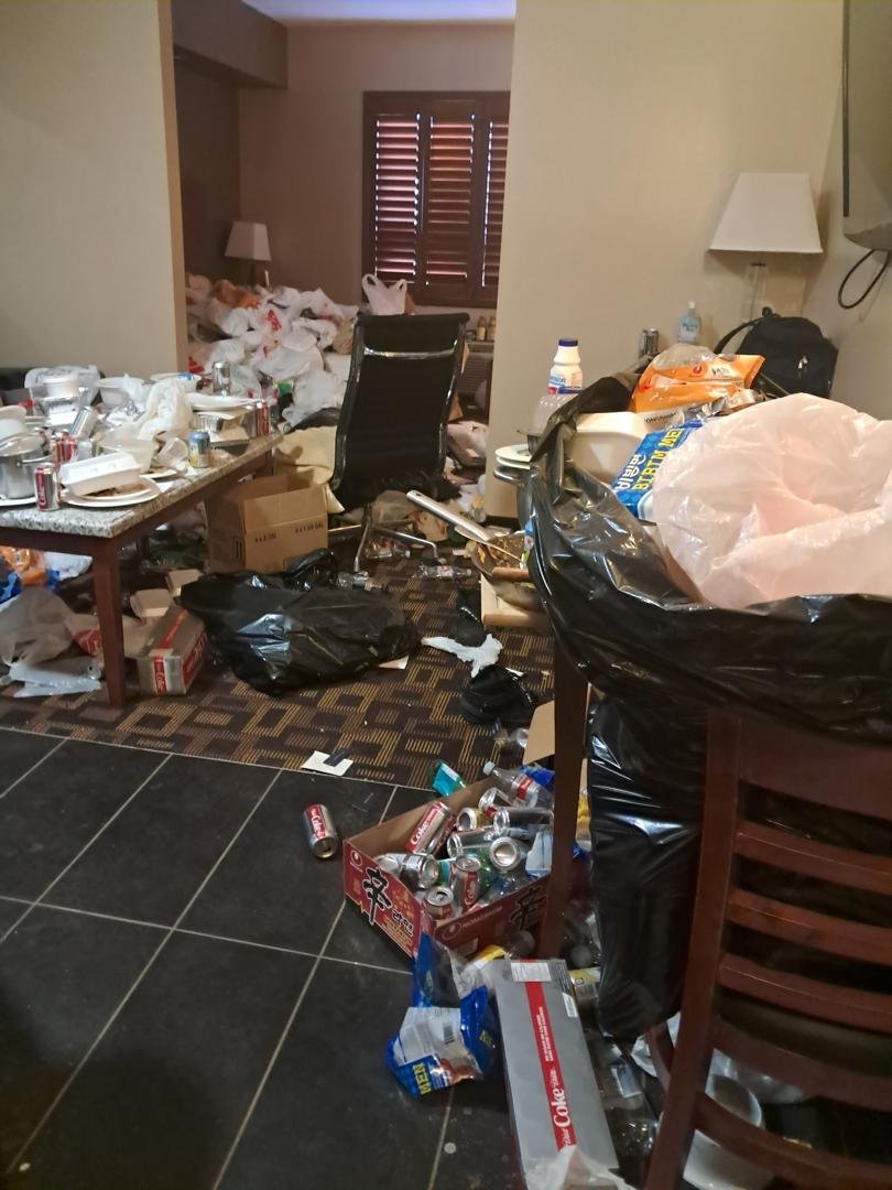 Hotel room with extensive clutter before ELR recovery