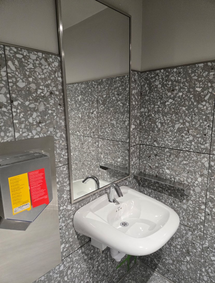 Tim Hortons washroom sink and mirror after cleaning